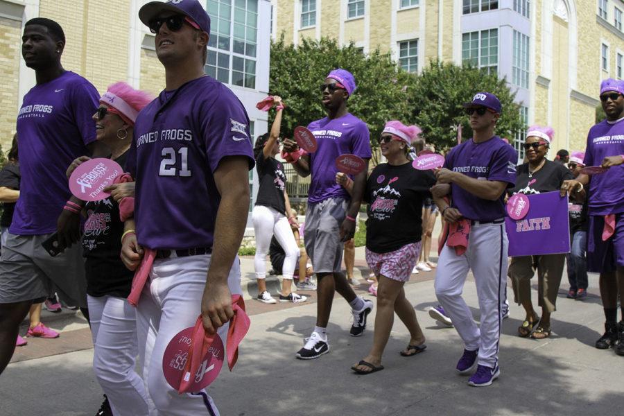 TCU baseball and mens basketball teams escorts breast cancer survivors during the filming of Frogs for the Cure video, Sunday, Aug. 30. (Alexandra Plancarte/TCU360)