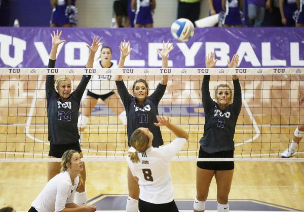 Three Horned Frogs attempt to block at the net.