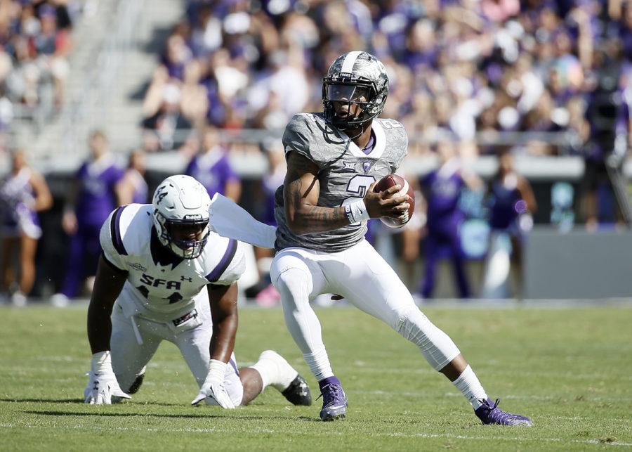 TCU quarterback Trevone Boykin is pressured out of the pocket by Stephen F. Austins Jamal Allen (44) in the first half of an NCAA college football game Saturday, Sept. 12, 2015, in Fort Worth, Texas. (AP Photo/Tony Gutierrez)