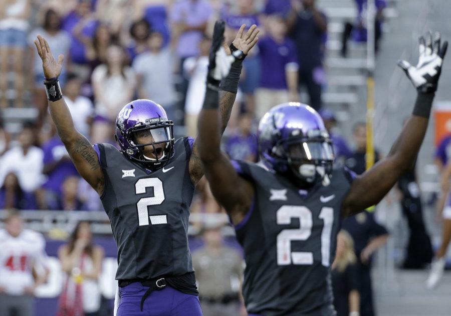 In this Oct. 25, 2014, file photo, TCU quarterback Trevone Boykin (2) and running back Kyle Hicks (21) celebrate after a touchdown against Texas Tech in the second half of an NCAA college football game in Fort Worth, Texas. TCU won 82-27. All that scoring caused this seasons average length of game to hit 3 hours, 23 minutes in late November, according to the NCAA. (AP Photo/Tony Gutierrez, File)