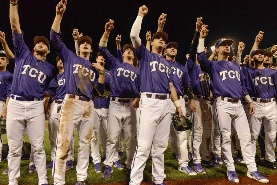 TCU+celebrates+with+the+fans+in+the+stands%2C+following+an+NCAA+College+World+Series+baseball+elimination+game+against+LSU+in+Omaha%2C+Neb.%2C+Thursday%2C+June+18%2C+2015.+TCU+won+8-4%2C+sending+LSU+home.+%28AP+Photo%2FMike+Theiler%29