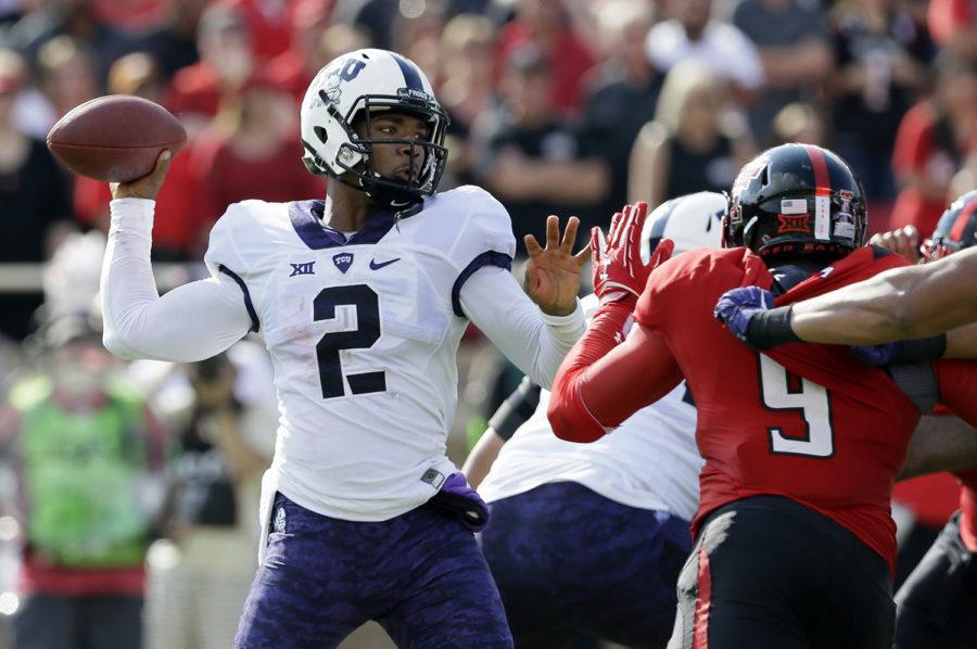 TCU+quarterback+Trevone+Boykin+%282%29+throws+a+pass+under+pressure+from+Texas+Tech+defensive+lineman+Branden+Jackson+%289%29+during+the+first+half+of+an+NCAA+college+football+game%2C+Saturday%2C+Sept.+26%2C+2015%2C+in+Lubbock%2C+Texas.+%28AP+Photo%2FLM+Otero%29