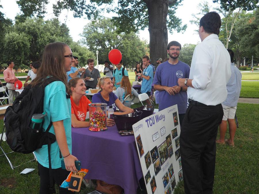 Members of TCU Wesley engaging with students at the Faith Festival. 