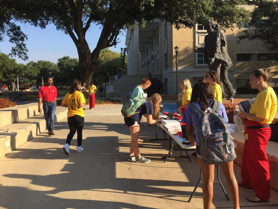 Students registering for Up ‘Til Dawn in front of the Founder’s Statue.
