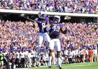 Josh Doctson and Cliff Murphy celebrate a touchdown against Oklahoma State last October at Amon G. Carter Stadium.