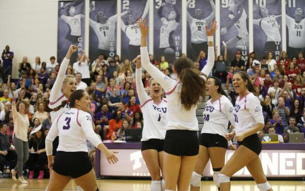 The TCU volleyball team celebrates during its match against Oklahoma on Oct. 7.