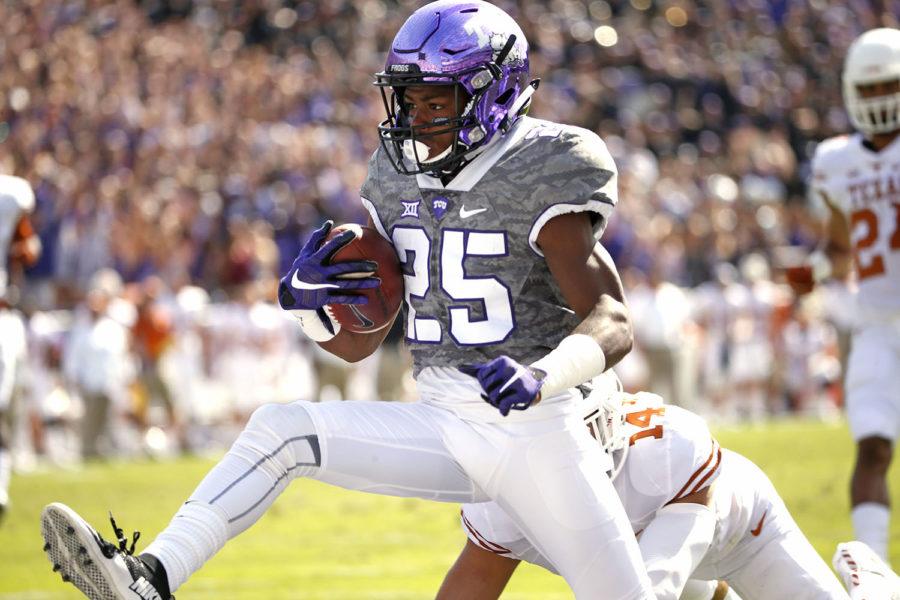 TCU+wide+receiver+KaVontae+Turpin+%2825%29+takes+a+touchdown+pass+across+the+goal+line+as+Texas+safety+Dylan+Haines+%2814%29+defends+in+the+first+quarter+of+an+NCAA+college+football+game%2C+Saturday%2C+Oct.+3%2C+2015%2C+in+Fort+Worth%2C+Texas.+%28AP+Photo%2FRon+Jenkins%29