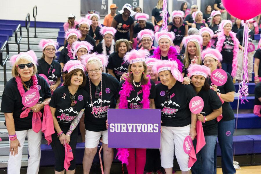 Ann Louden, leader and chair of TCUs Frogs for the Cure, surrounded by fellow breast cancer survivors at campus music video shoot. 