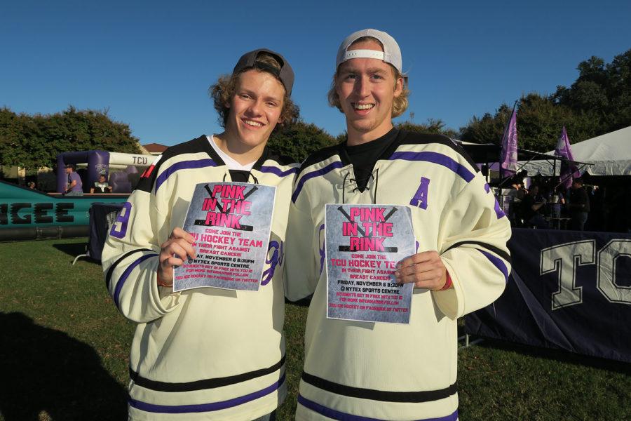 Alex Martin (left) and Cole Goulet (right) who are members of TCU Ice Hockey came to the game and hoped  to raise awareness among frog fans about Pink in the Rink event. 