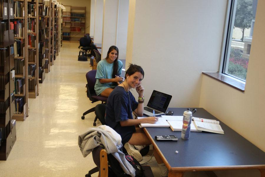 There are several quiet zones on the west side of Mary Couts Burnett library.  Dani Black, freshman biology major and Meg Cooksey, sophomore neuroscience major study in the quiet zone of the first floor. 