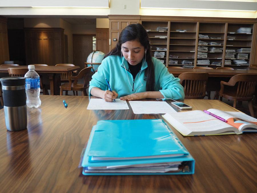 Junior biology major Leslie Gonzalez studies for organic chemistry in the periodical section of the Mary Couts Burnett Library. 