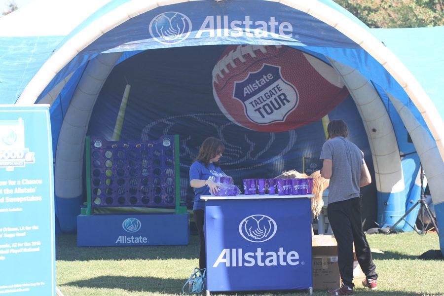 The Allstate Tailgate Tour crew sets up their area for the Allstate Its Good Sweepstakes. The winner receives $100,000, a trip to the Allstate Sugar Bowl, and a trip to Phoenix, Arizona, for the College Football National Championship.