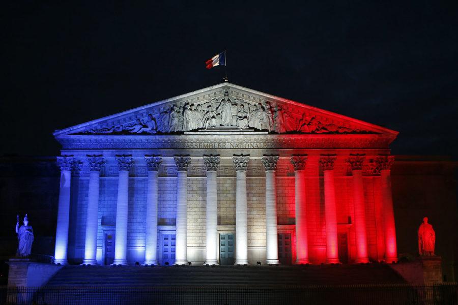 The French Assemblee Nationale which houses the bicameral Parliament is lit in the French National flag colors, in Paris, France, Sunday, Nov. 22, 2015 one week after the Paris attacks. Several TCU students and faculty are studying abroad in France, all of whom are accounted for and safe. (AP Photo/Francois Mori)