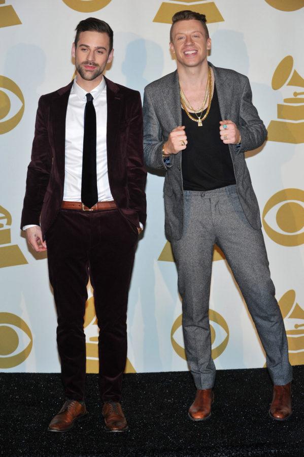 Ryan Lewis, left, and Macklemore pose backstage at the Grammy Nominations Concert Live! on Friday, Dec. 6, 2013, at the Nokia Theatre L.A. Live in Los Angeles. (Photo by Richard Shotwell/Invision/AP)