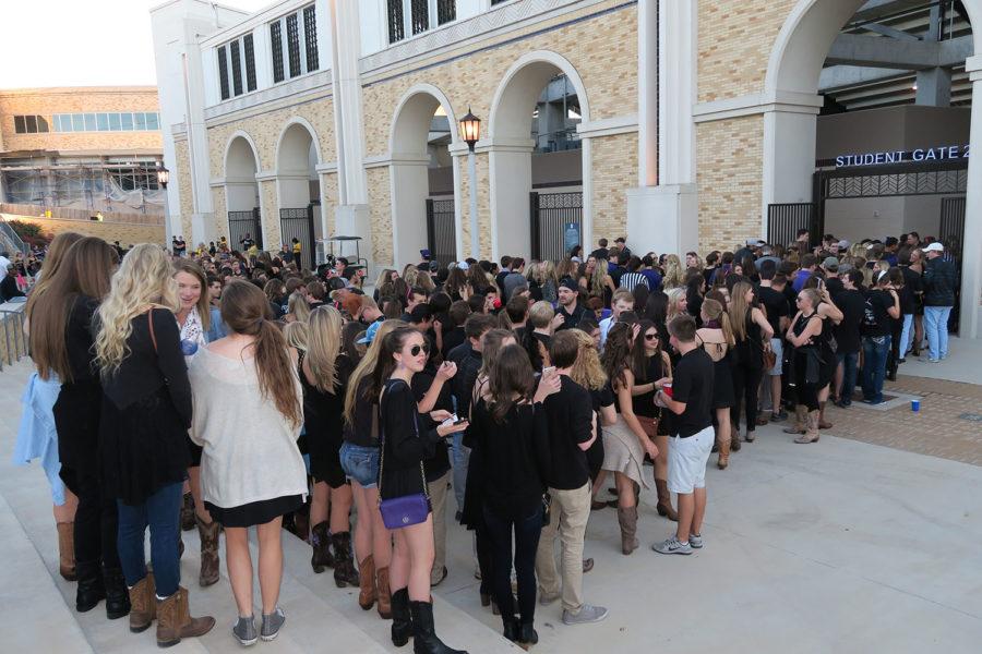 TCU students waited for their turns to go through the gate which was designated for students. 