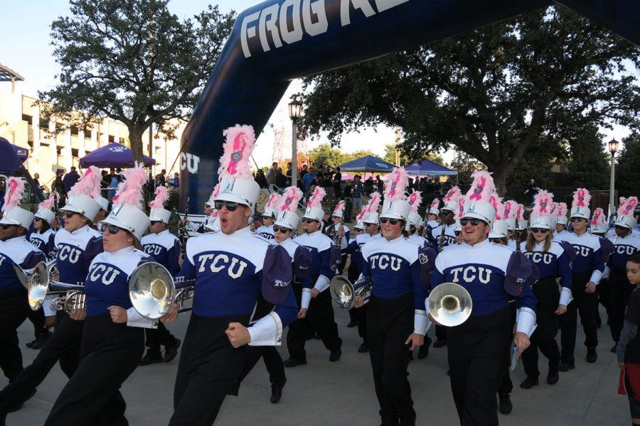 TCU+marching+band+marched+through+the+Frog+Alley+as+they+made+their+way+to+the+stadium.+