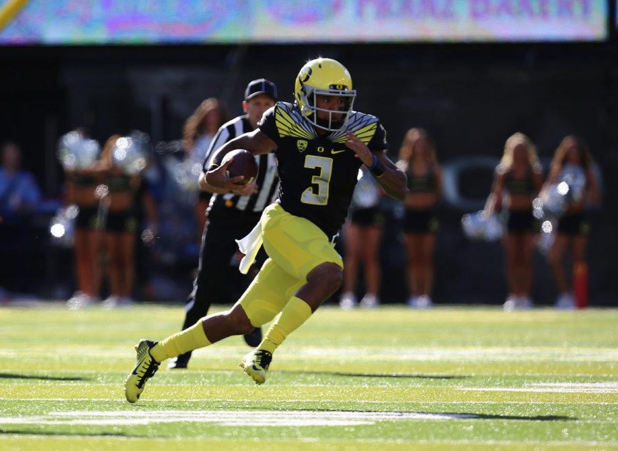 Oregon quarterback Vernon Adams Jr. (3) runs the ball during the first half of an NCAA college football game against Eastern Washington Saturday, Sept. 5, 2015, in Eugene, Ore. 