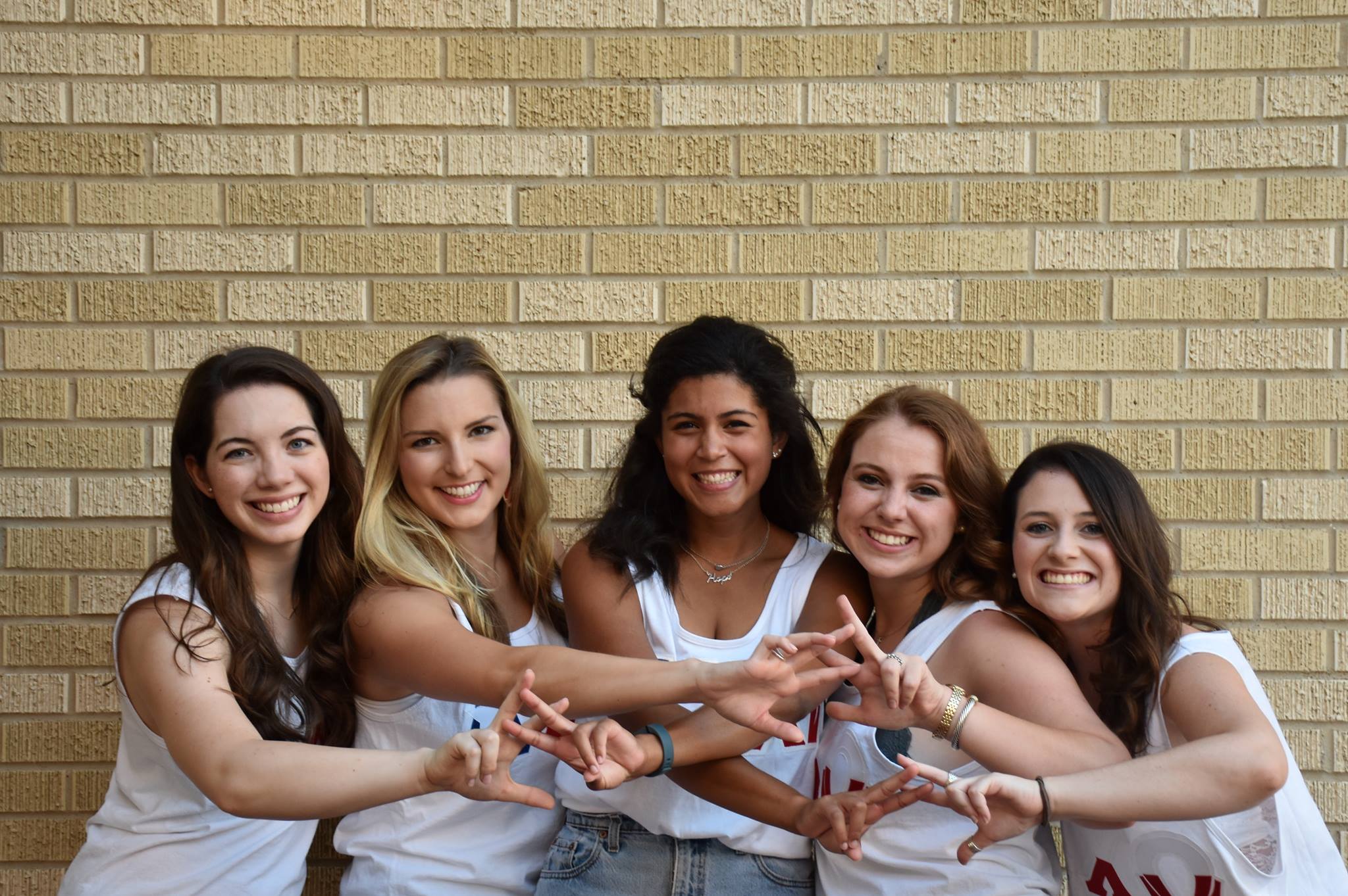 Tew pictured with her Alpha Chi Sorority sisters including her “Little” Shelly Laroche (far right.)