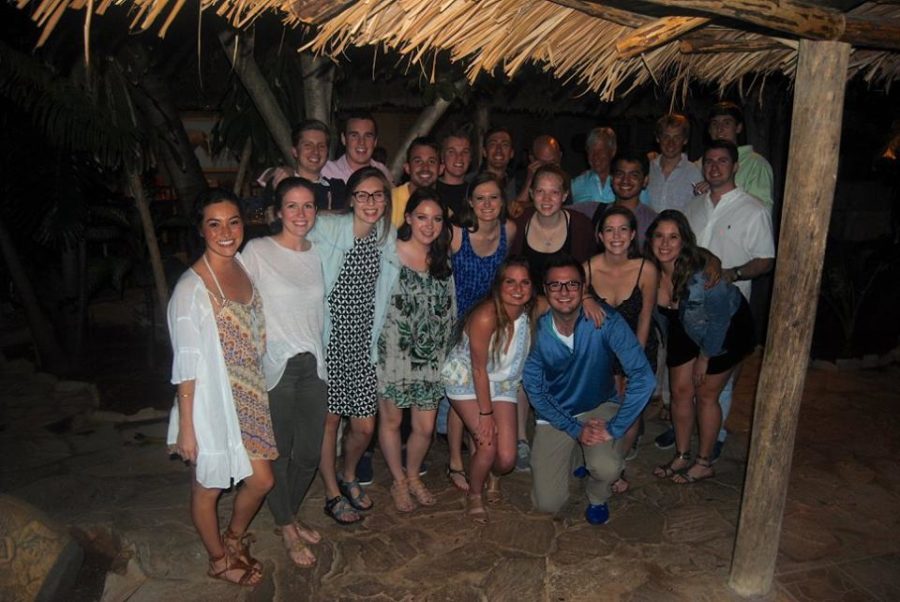 Students+pose+for+a+picture+at+a+dinner+gathering+in+Matanzas%2C+Cuba.