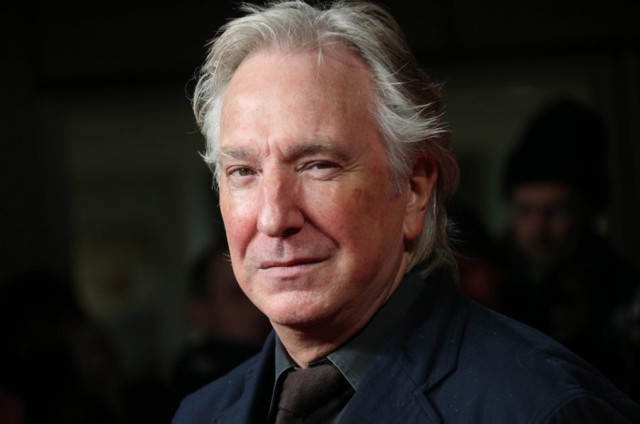 British actor Alan Rickman arrives on the red carpet for the UK Premiere of The Invisible Woman at the Odeon Kensington in west London, Jan. 27, 2014. 