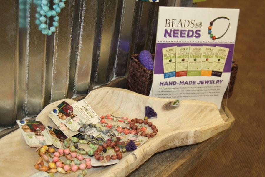 Sixteen students from Gras’ class designed a display for the TCU bookstore. Some students designed bead charm bracelets, knitted headbands, necklaces, earrings and purple boot cuffs; others figured out the best way to present the items in the display. 