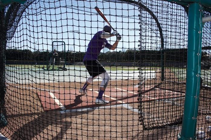Dane Steinhagen takes his turn during batting practice at the Frogs' first practice in January. 