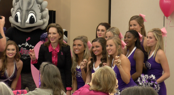 TCU Cheer and Super Frog join Frogs for the Cure Chair Ann Louden at the thank you celebration. 