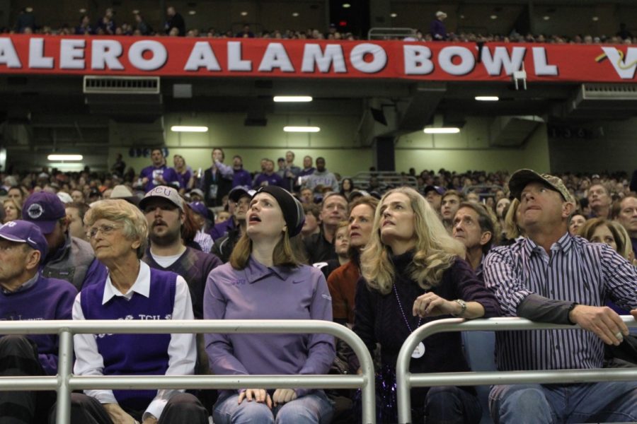 TCU fans watch the first half of the 2016 Valero Alamo Bowl, in which the Frogs overcame a 31-point deficit to beat the Oregon Ducks 47-41 in the San Antonio Alamodome on Jan. 2, 2016.