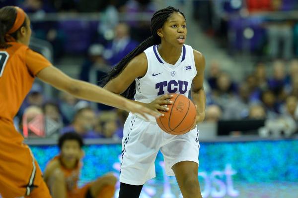 TCUs Jada Butts looks to pass against No. 6 Texas in Schollmaier Arena in Fort Worth on Jan. 20, 2015. 