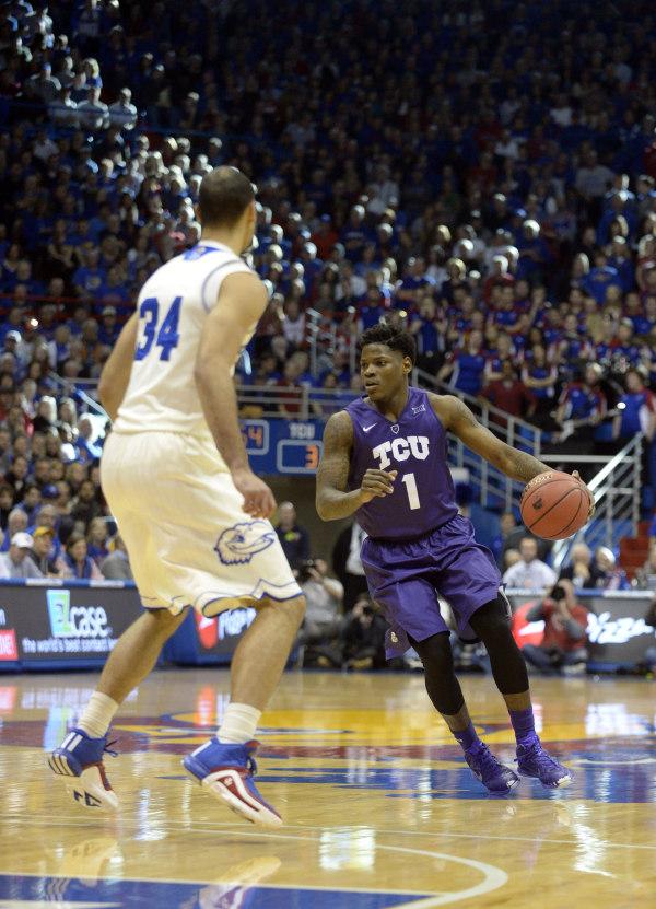 Chauncey Collins runs the show against the Kansas Jayhawks at Allen Fieldhouse in Lawrence, Kan. on January 17, 2016. 