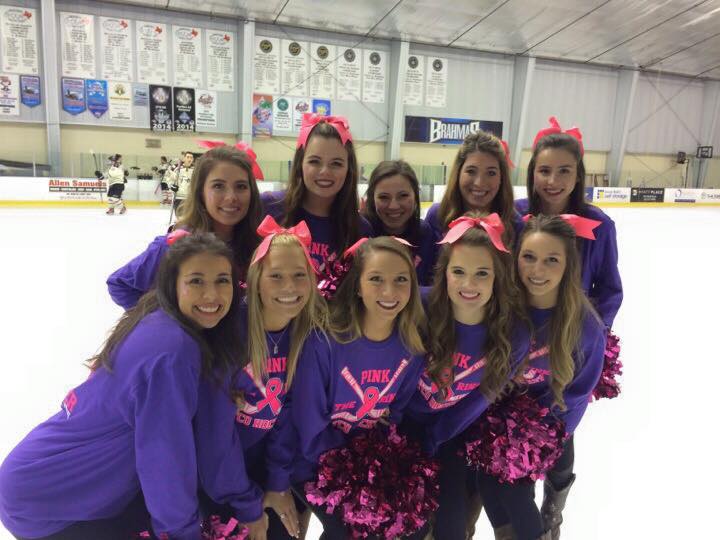 A few of the current TCU Ice Girls at the Pink Out game.