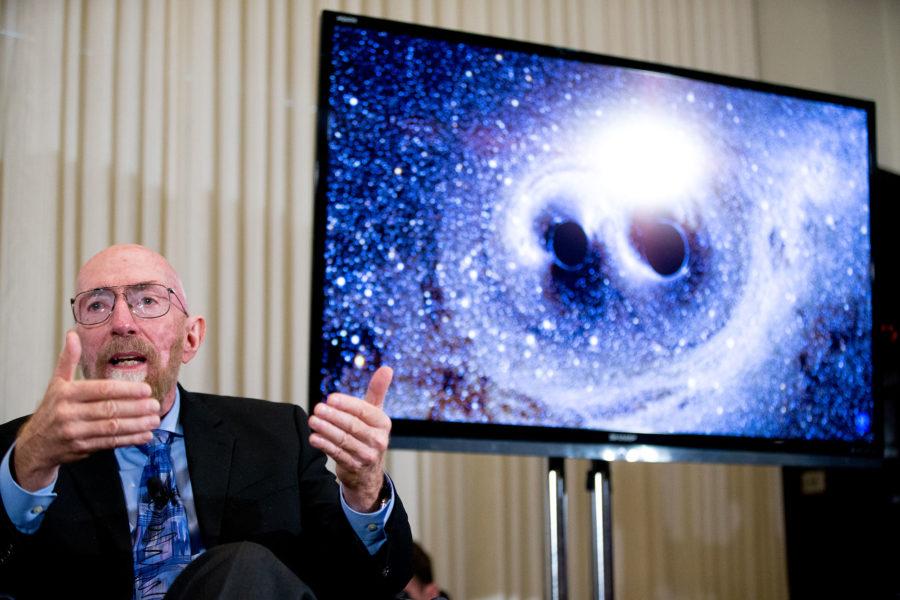 Laser+Interferometer+Gravitational-Wave+Observatory+%28LIGO%29+Co-Founder+Kip+Thorne+speaks+next+to+a+visual+of+gravitational+waves+from+two+converging+black+holes%2C+right%2C+during+a+news+conference+at+the+National+Press+Club+in+Washington%2C+Thursday%2C+Feb.+11%2C+2016%2C+to+announce+that+scientists+they+have+finally+detected+gravitational+waves%2C+the+ripples+in+the+fabric+of+space-time+that+Einstein+predicted+a+century+ago.+The+announcement+has+electrified+the+world+of+astronomy%2C+and+some+have+likened+the+breakthrough+to+the+moment+Galileo+took+up+a+telescope+to+look+at+the+planets.+%28AP+Photo%2FAndrew+Harnik%29
