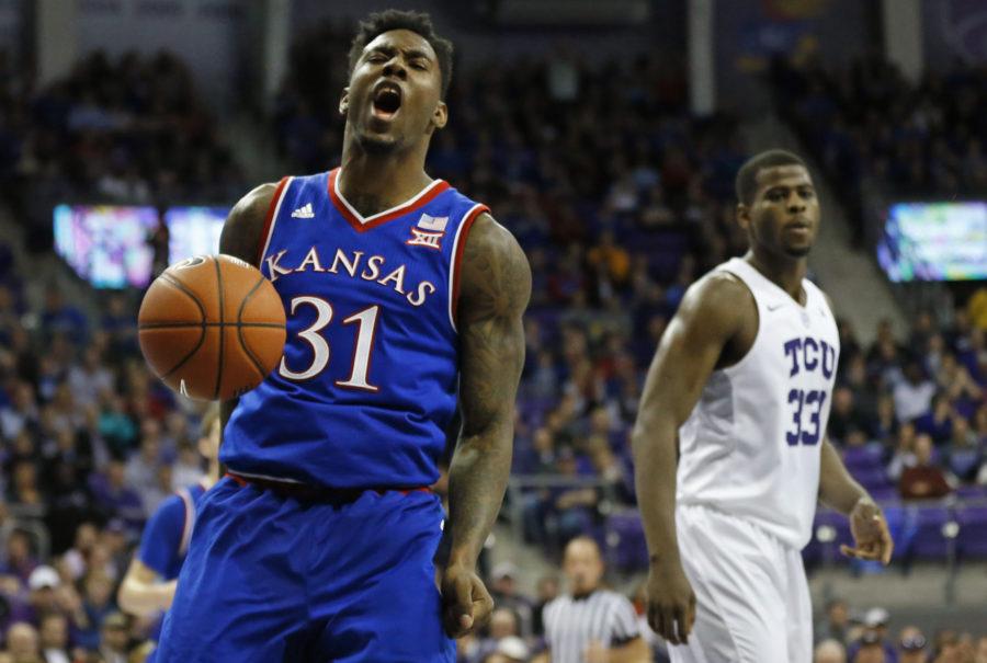 Kansas+forward+Jamari+Traylor+%2831%29+reacts+after+scoring+as+TCU+forward+Chris+Washburn+%2833%29+looks+on+during+the+first+half+of+an+NCAA+college+basketball+game%2C+Saturday%2C+Feb.+6%2C+2016%2C+in+Fort+Worth%2C+Texas.+