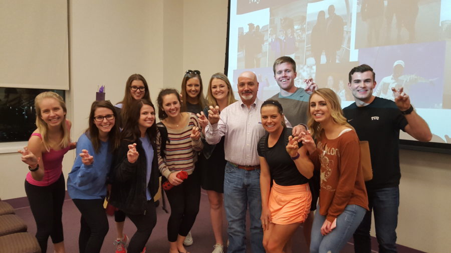 Dr. Bob Akin with students after his presentation in the Last Lecture Series. 