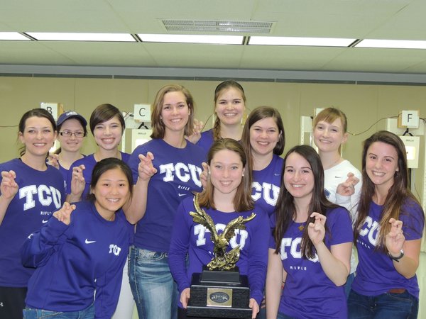 The TCU Womens Rifle team poses with the PRC Championship trophy. 