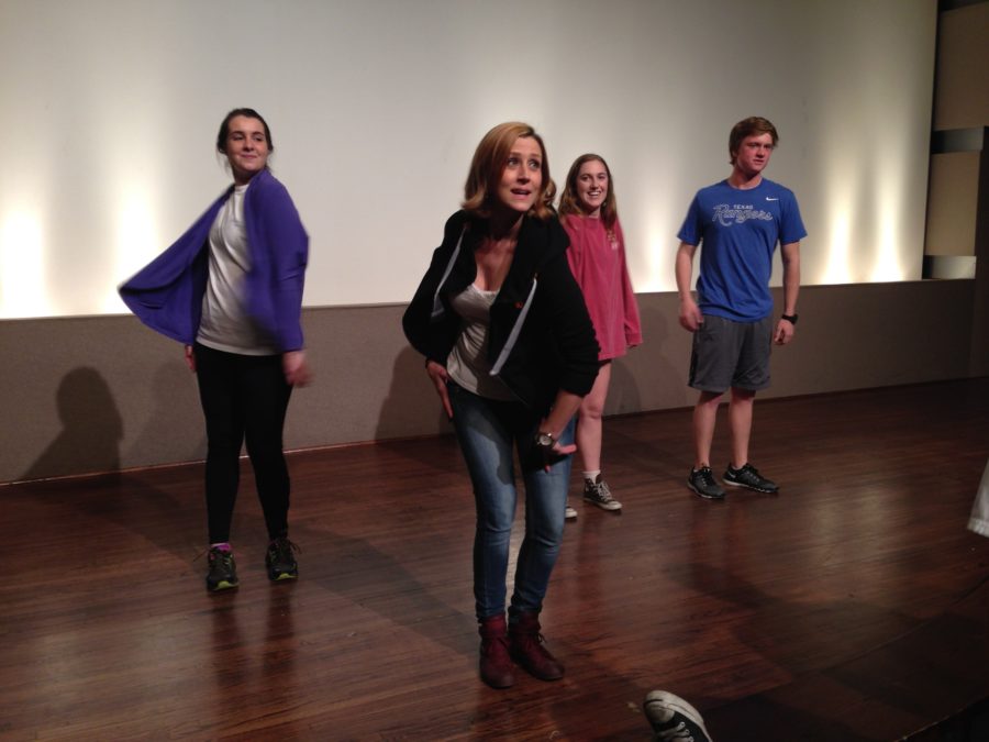 Lydia Mackay, an adjunct in the theater department, leads her Survey of Theater class in a warmup on Feb. 11.