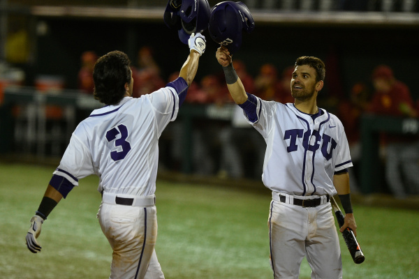 Elliott Barzilli and Ryan Merrill celebrate during game 2 against USC