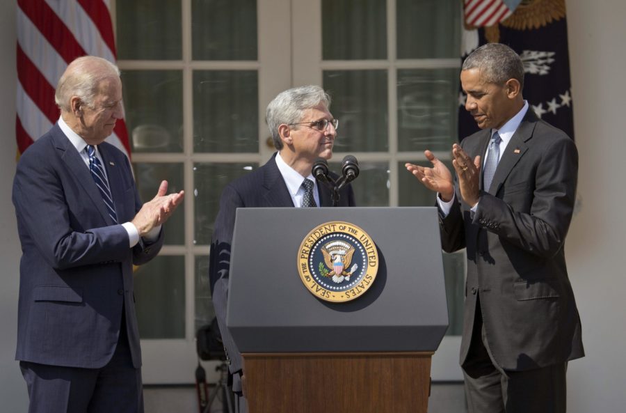 Federal appeals court judge Merrick Garland stands with President Barack Obama and Vice President Joe Biden as he is introduced as Obamas nominee for the Supreme Court during an announcement in the Rose Garden of the White House, in Washington. 