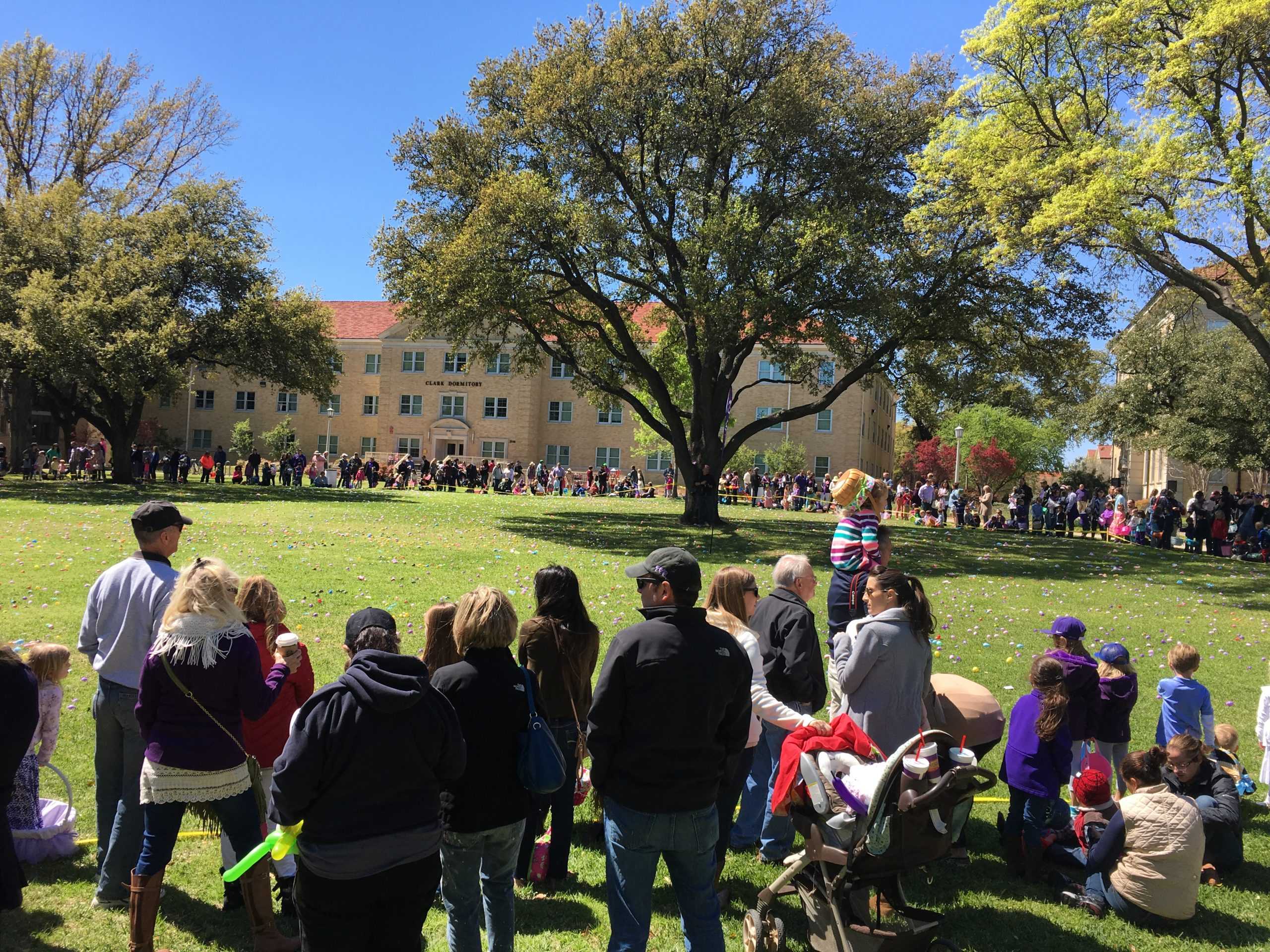 TCU+Alumni+and+their+families+gather+outside+of+Sadler+Hall+Sunday+afternoon+for+the+22nd+annual+Easter+Egg+Hunt+and+family+picnic.+