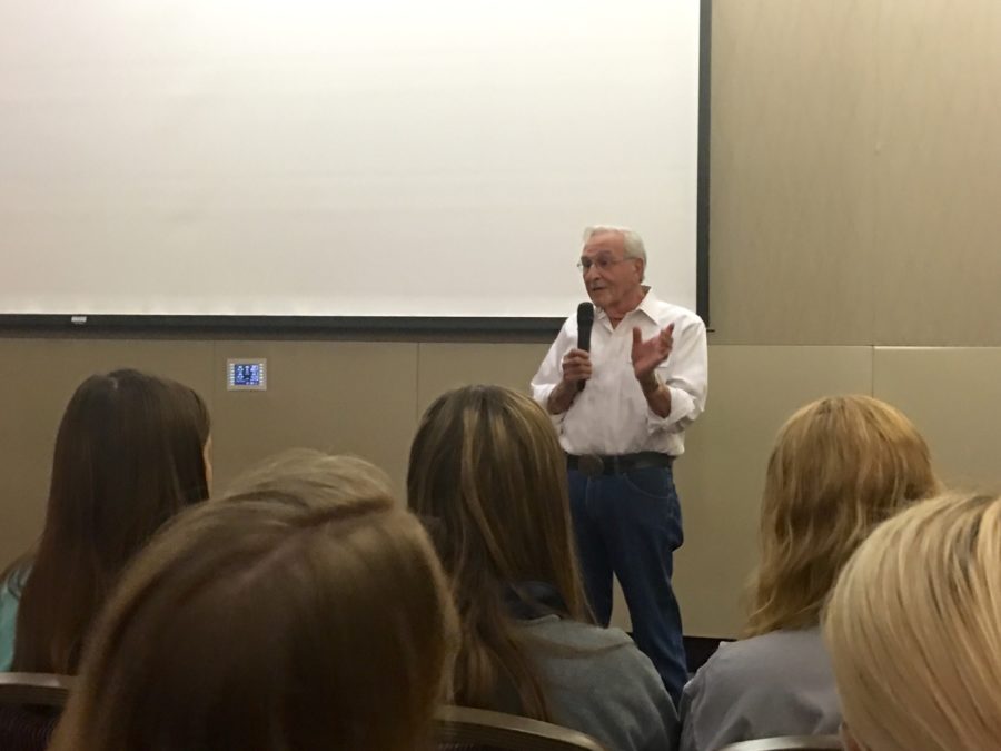 Holocaust survivor Harry Kahn speaks to students, faculty and community members. 