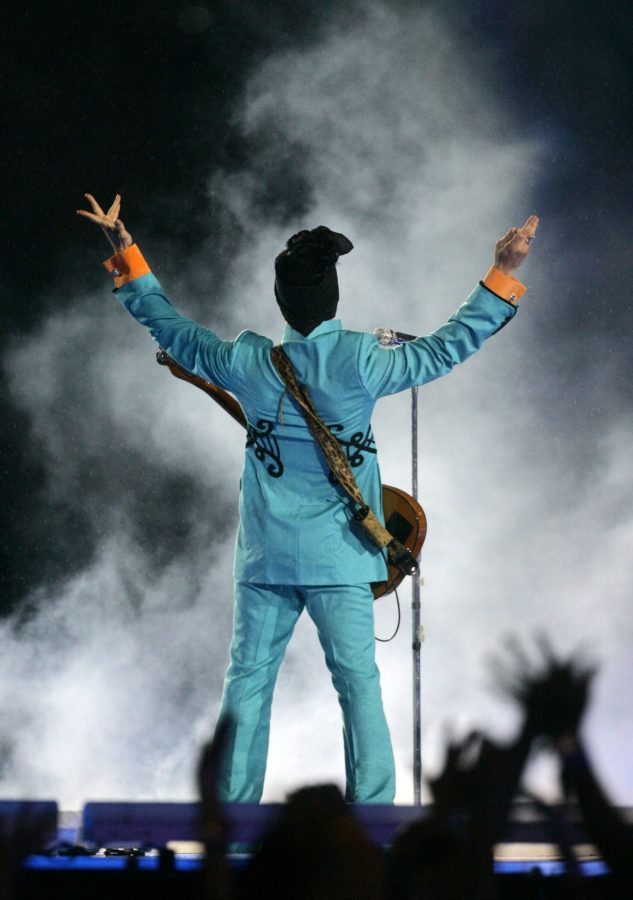 FILE - In this Feb. 4, 2007 file photo, Prince performs during the halftime show at Super Bowl XLI at Dolphin Stadium in Miami. Princes publicist has confirmed that Prince died at his home in Minnesota, Thursday, April 21, 2016. He was 57. 