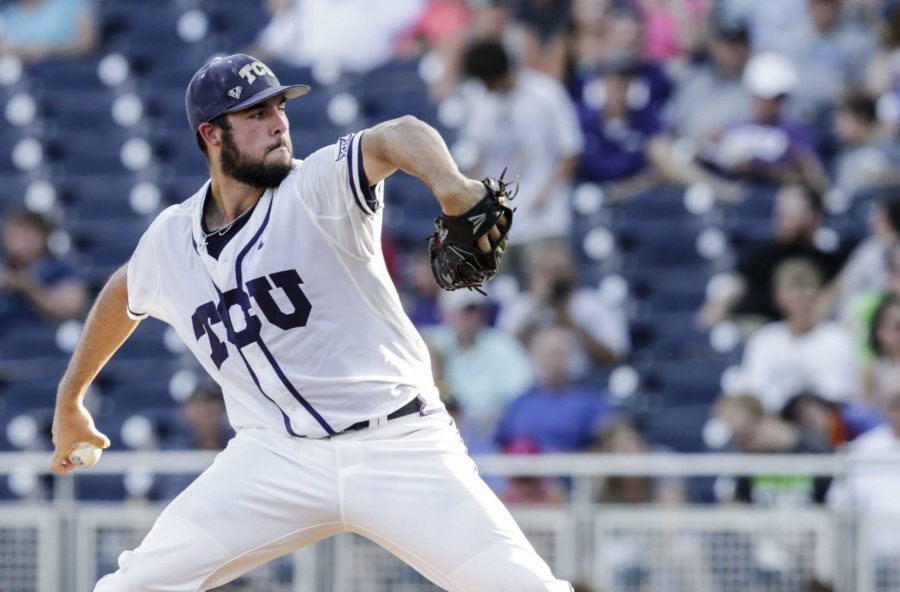 TCU starting pitcher Mitchell Traver delivers during the first inning of an NCAA College World Series baseball game against Coastal Carolina in Omaha, Neb., Friday, June 24, 2016. (AP Photo/Nati Harnik)
