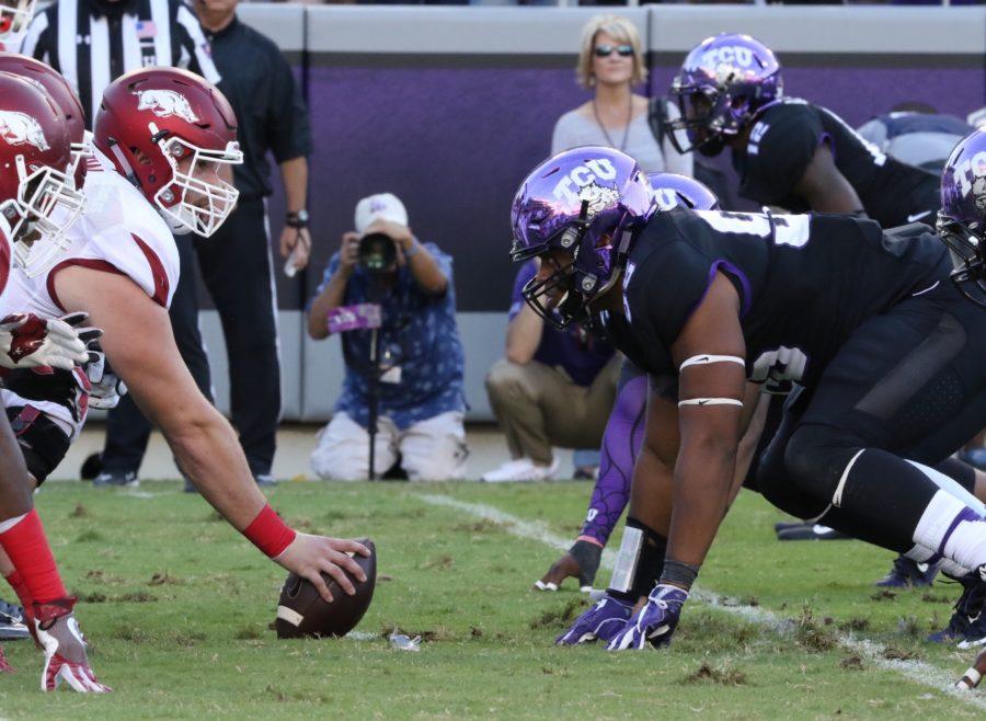 TCU+and+Arkansas+ready+themselves+for+the+next+play.+Courtesy+of+Sam+Bruton