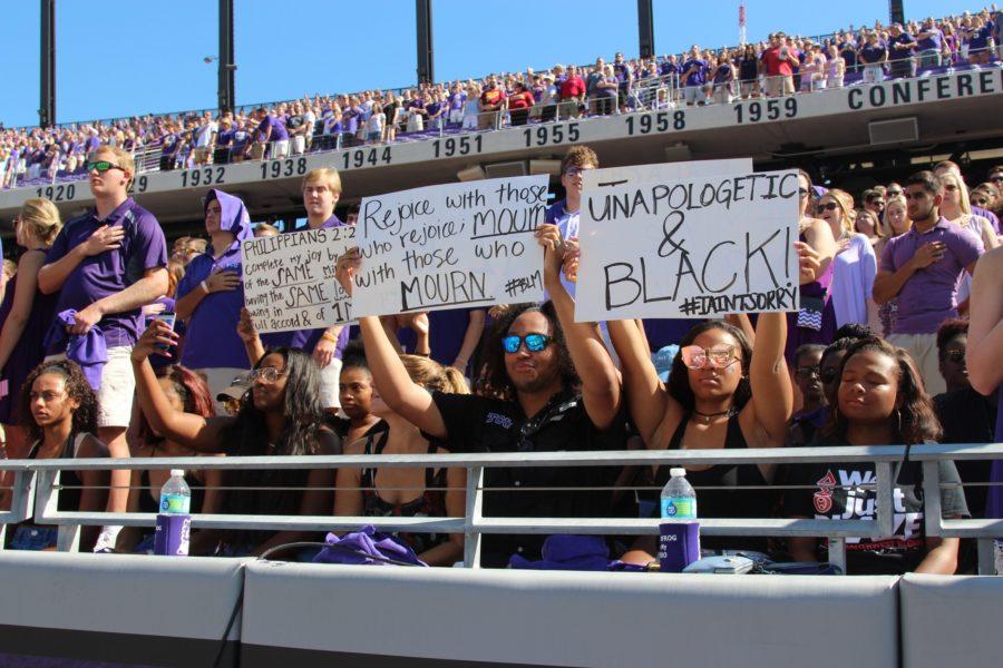 A+group+of+TCU+students+participated+in+a+silent+demonstration+during+the+National+Anthem.+