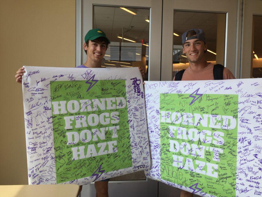 Members of Kappa Sigma and Phi Gamma Delta hold a banner against hazing. (Nicole Strong/TCU360)