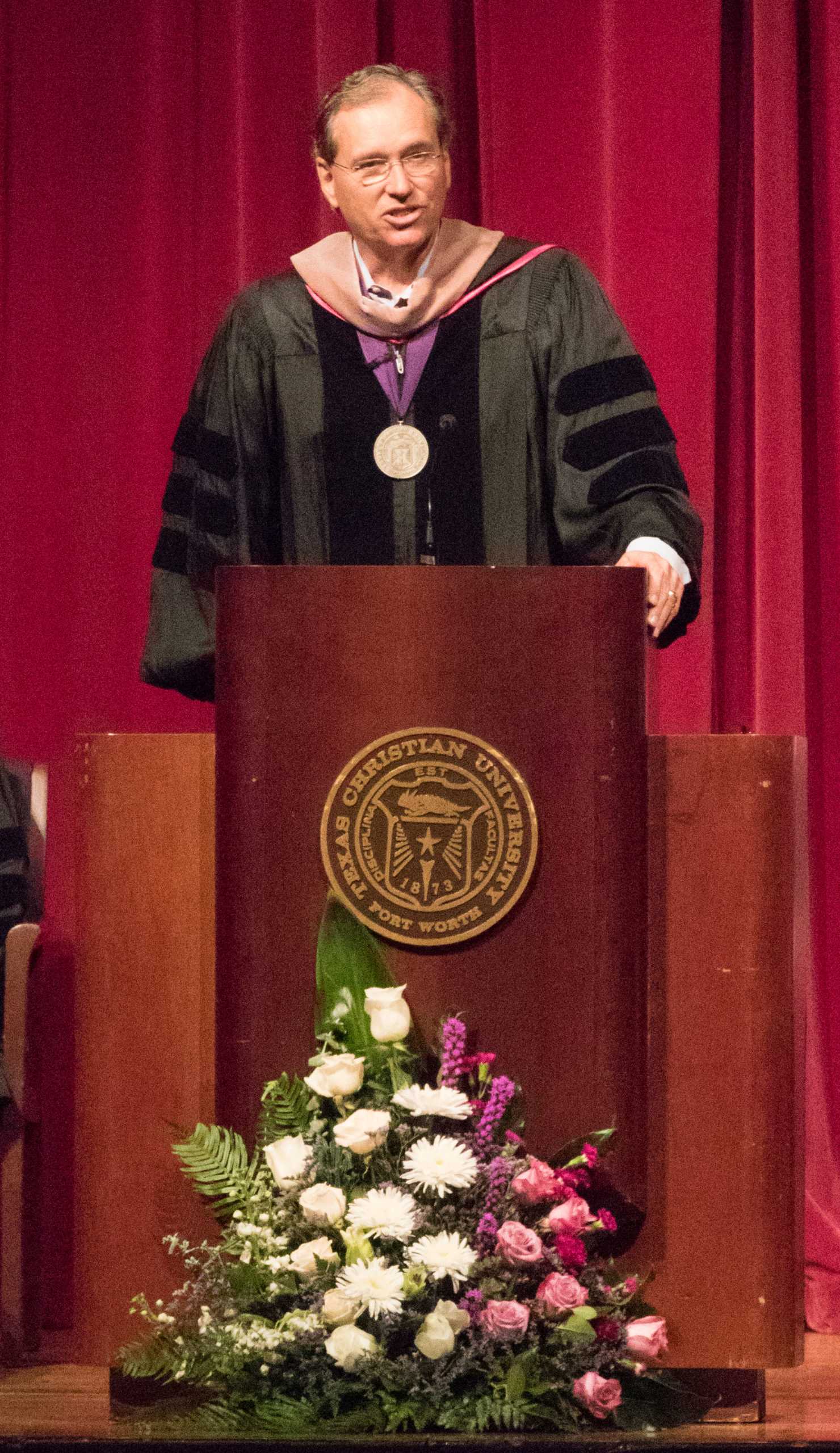 Dr. William Cron accepts the Chancellor's Award at the 2016 Fall Convocation. (Sam Bruton/TCU360)