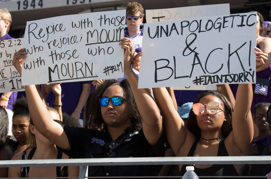 About 20 students sat during the National Anthem at Saturdays game against Iowa State. (Sam Bruton/ TCU360)