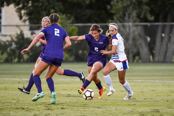 Meghan Murphy and Lauren Sajewich play against Kansas. (photo courtesy: gofrogs.com) 