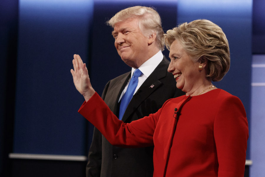 Republican presidential candidate Donald Trump, left, stands with Democratic presidential candidate Hillary Clinton before the first presidential debate at Hofstra University, Monday, Sept. 26, 2016, in Hempstead, N.Y. (AP Photo/ Evan Vucci)