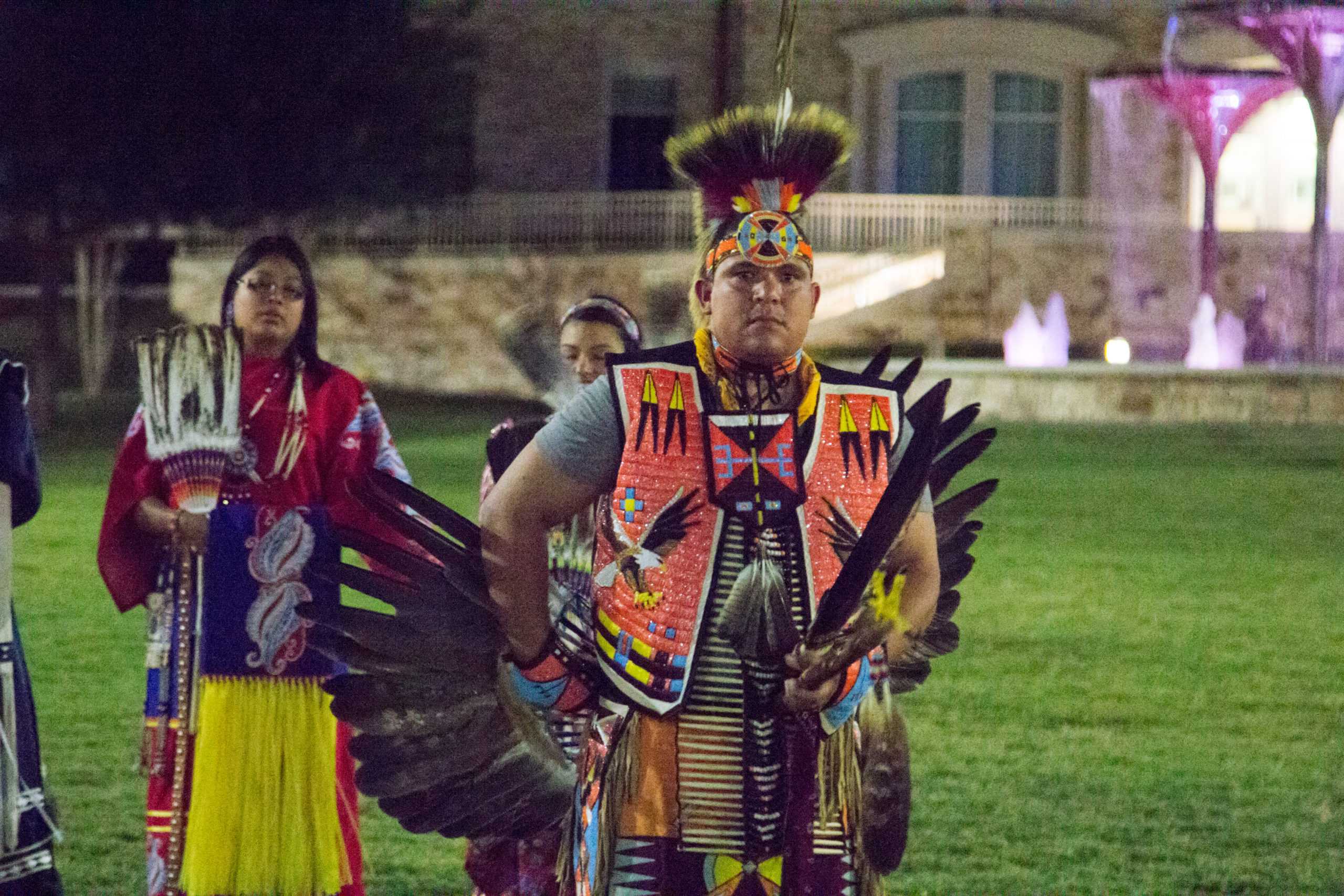 A dancer of the Tribal Traditions Arts and Education group dances in the Commons. (Sam Bruton/TCU Staff Photographer) 